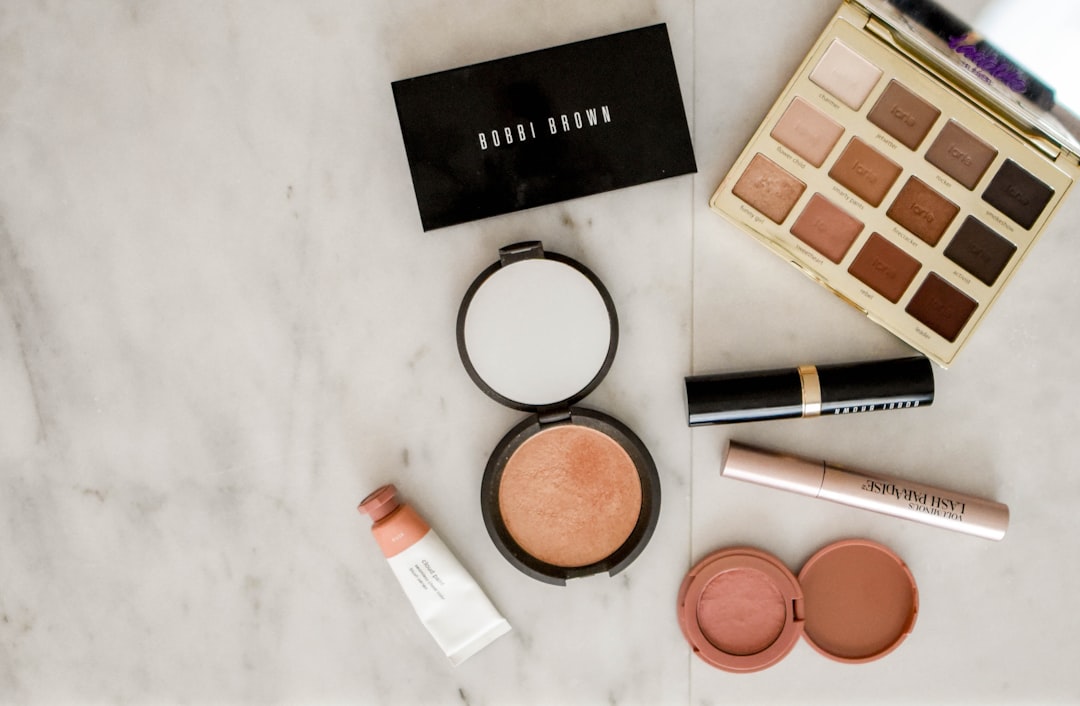 photo-of-assorted-makeup-products-on-gray-surface-cewgsmd8rvq